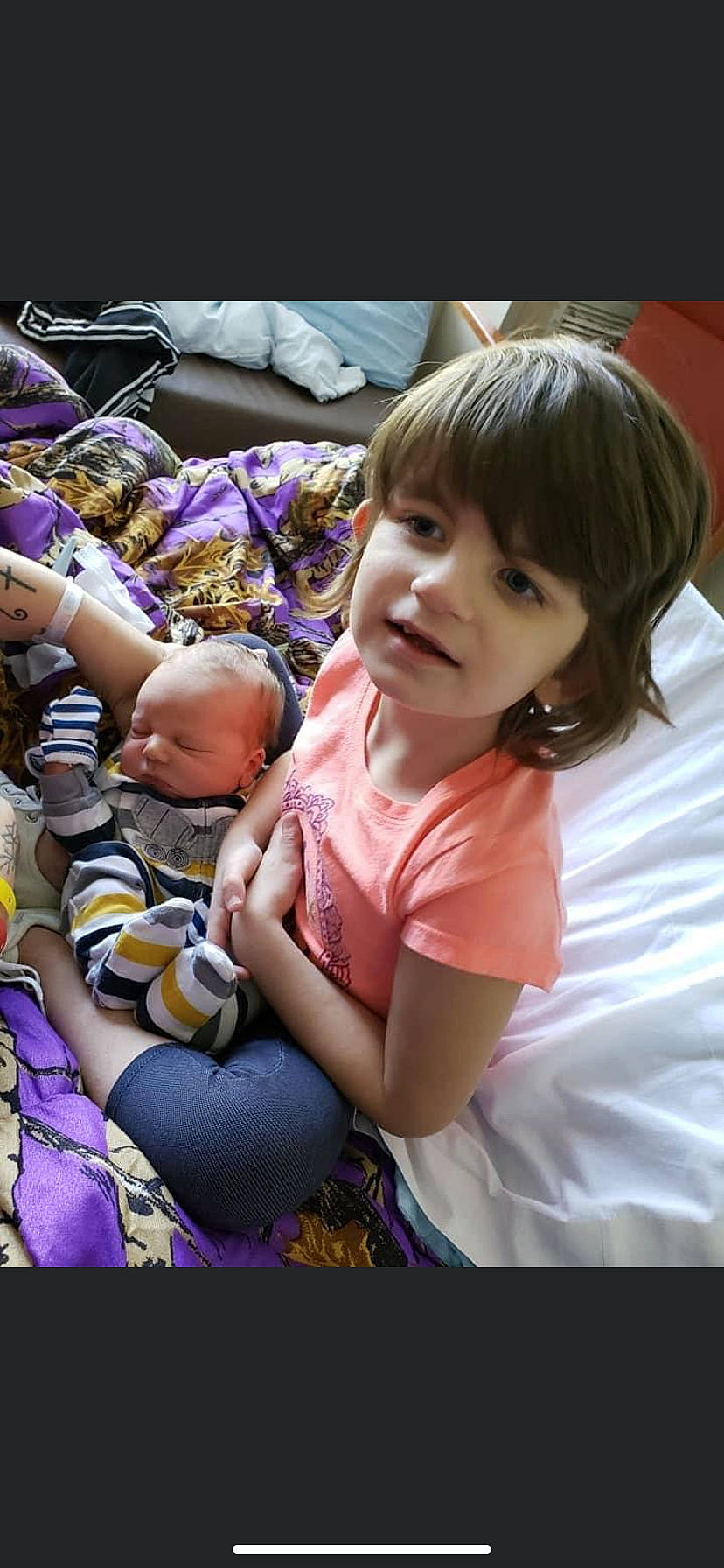 Jeremiah is registered to the contest to win money with this photo: baby, baby_products, bangs, child, event, fun, happy, jewellery, leisure, magenta, party, person, pink, play, purple, recreation, sitting, smile, t_shirt, toddler