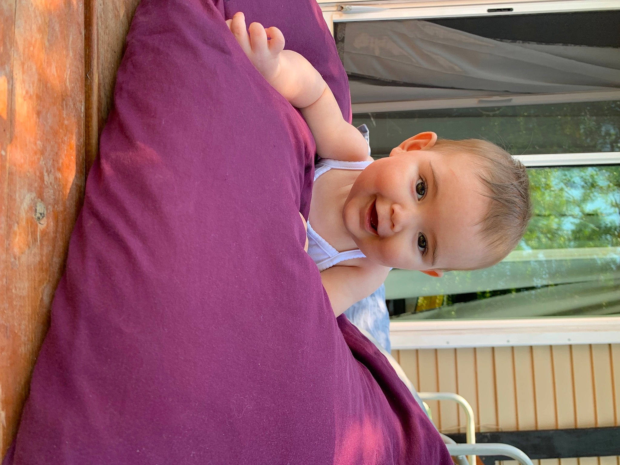 Aiyana is registered to the contest to win money with this photo: baby, blond, child, dress, fun, grass, happy, joy, leisure, magenta, person, pink, plant, recreation, skin, sleeve, smile, t_shirt, toddler, tree