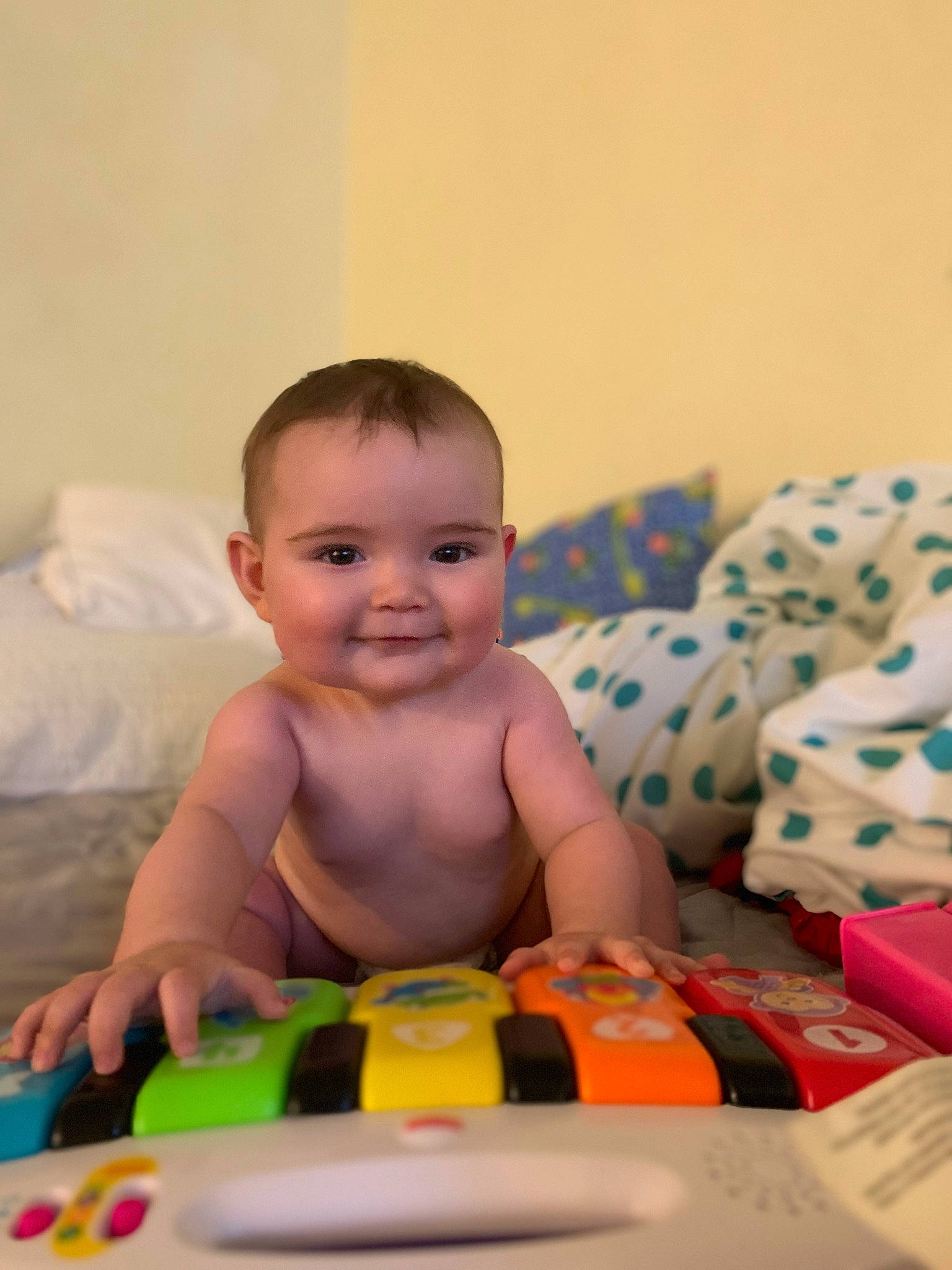 Aiyana is registered to the contest to win money with this photo: baby, baby_playing_with_toys, bathing, cheek, child, eye, facial_expression, finger, fun, hairstyle, happy, human_body, iris, joy, mouth, nose, people, person, product, skin