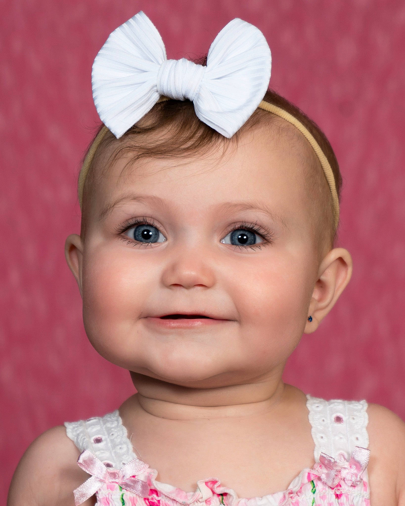 Callie is registered to the contest to win money with this photo: baby_toddler_clothing, cheek, chin, dress, ear, eye, eyebrow, eyelash, face, facial_expression, hair, hairstyle, happy, head, iris, joy, lip, person, pink, skin