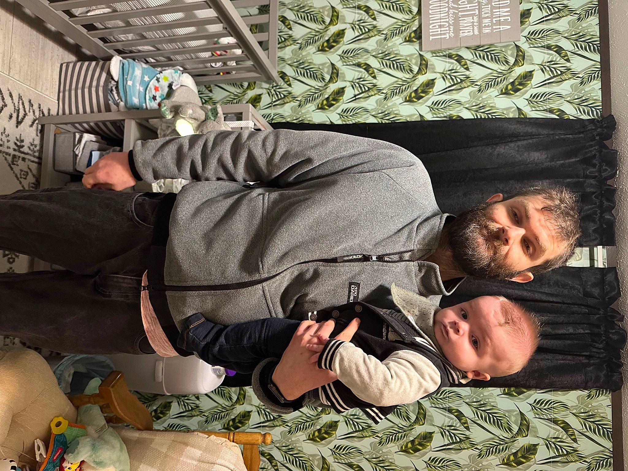 Kolton is registered to the contest to win money with this photo: child, comfort, cool, couch, fun, lap, linens, nap, people, person, room, sitting, square, suit, toddler, tree