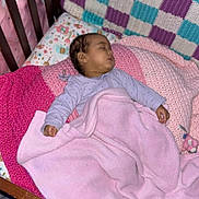 Kyrah joined the competition — help win amazing prizes! baby, baby_clothes, blanket, child, comfort, crib, floor, heart_patch, indoors, infant, knitted_blanket, pacifier, peaceful, pillow, pink_blanket, sleep, sleeping, sleepwear, soft_toys, wooden_crib