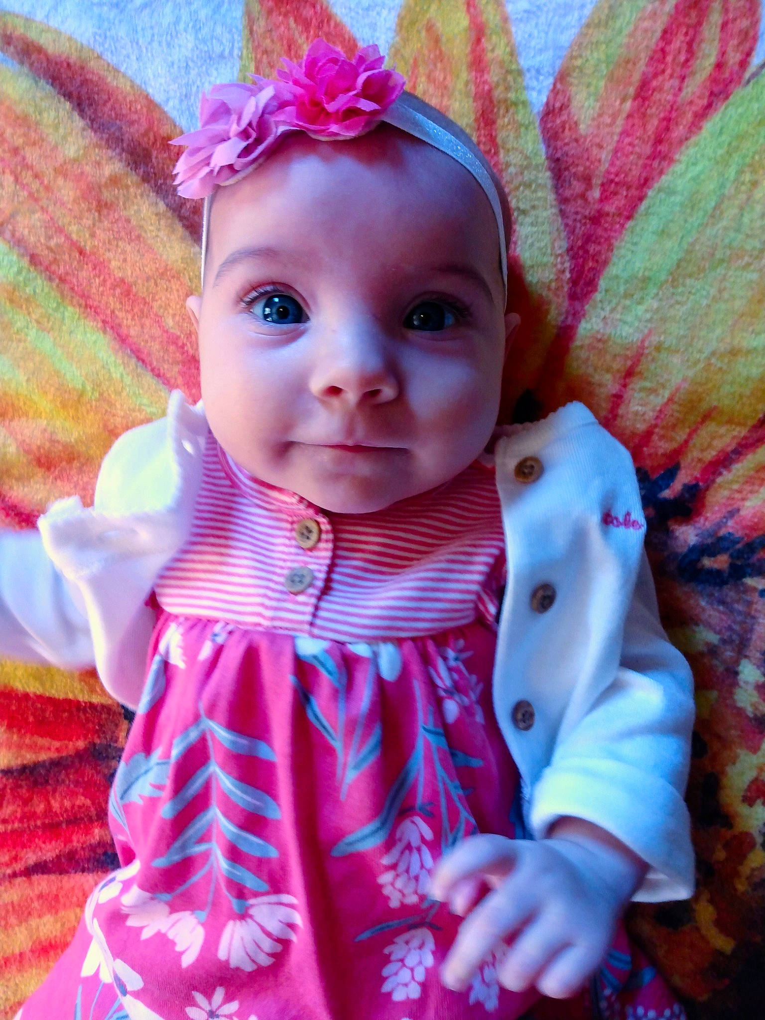 Irelyn is registered to the contest to win money with this photo: baby_toddler_clothing, cheek, doll, dress, eye, grass, head, headgear, iris, lip, magenta, person, pink, plant, purple, skin, sleeve, textile, toddler, toy