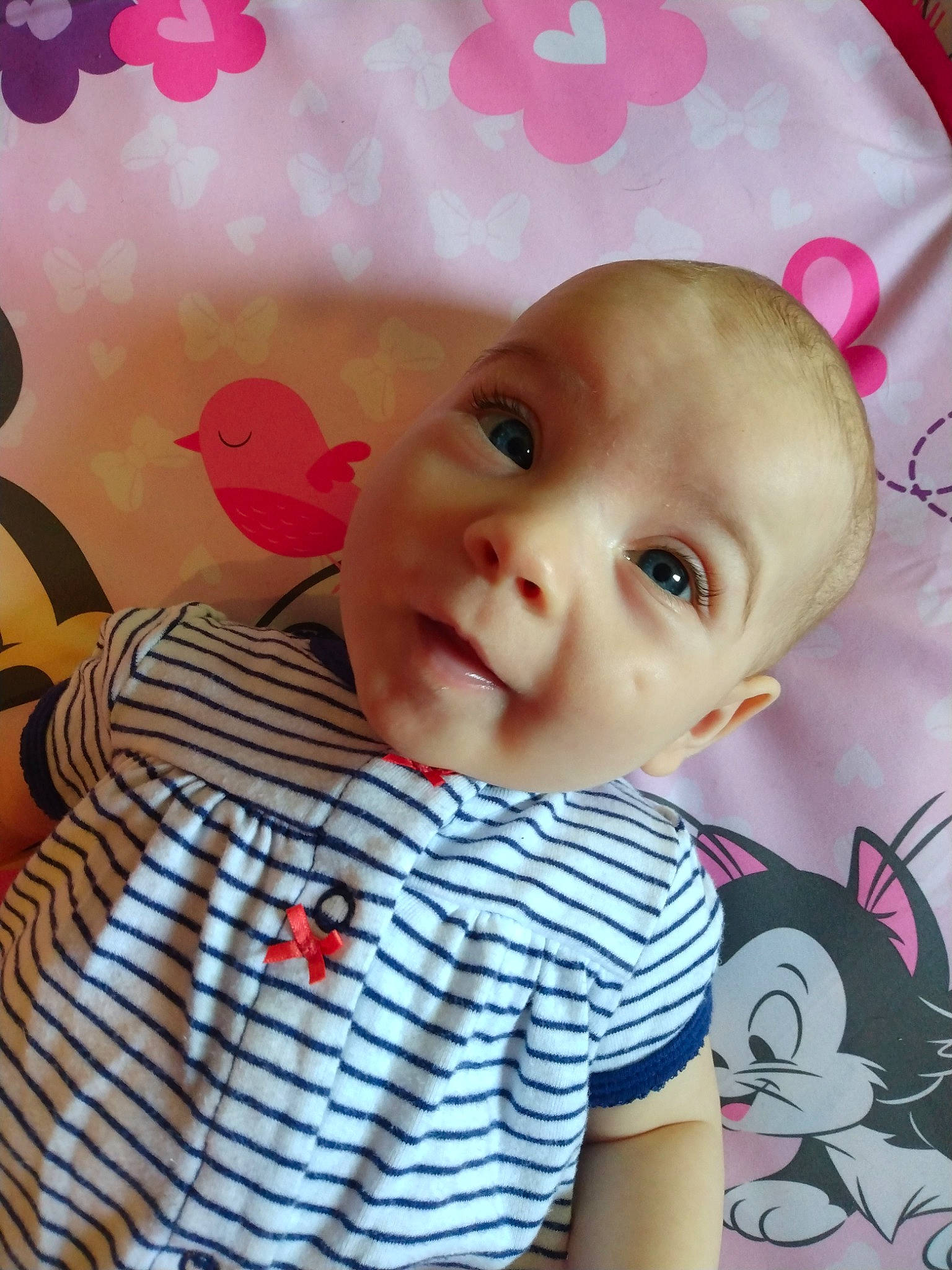 Irelyn is registered to the contest to win money with this photo: baby, baby_toddler_clothing, cheek, chin, eye, eyebrow, eyelash, face, hair, hairstyle, happy, head, iris, lip, nose, person, pink, skin, sleeve, smile