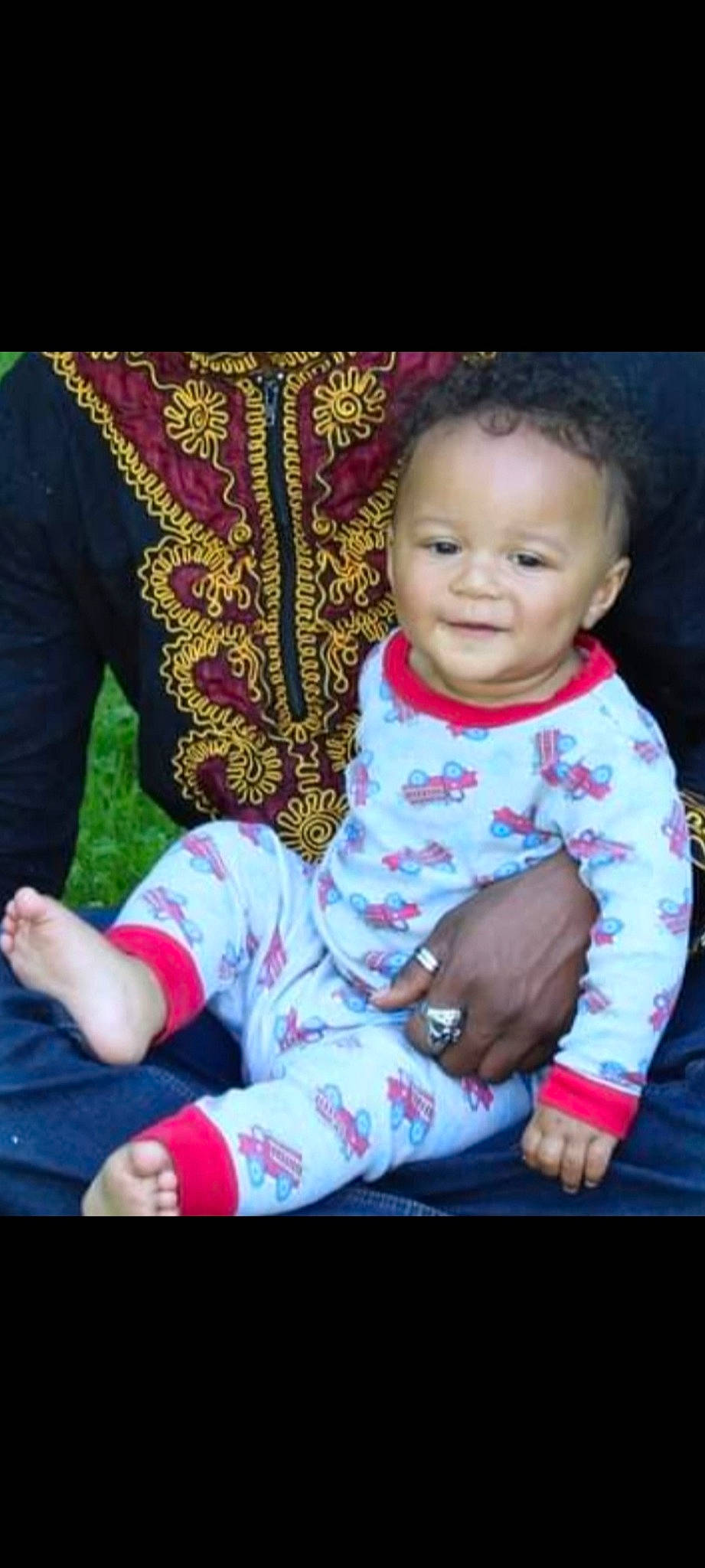 Alexzander joined the competition — help win amazing prizes! baby, baby_products, baby_toddler_clothing, cheek, child, fun, gesture, grass, happy, joy, lap, magenta, pattern, person, pink, purple, sitting, sleeve, smile, textile