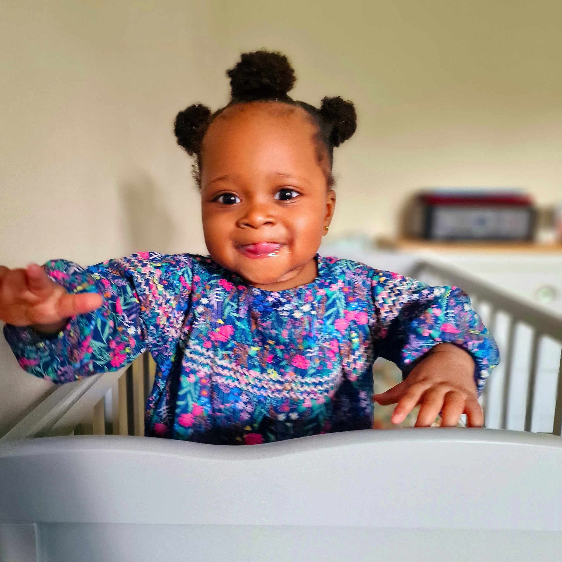 Eliana joined the competition — help win amazing prizes! baby, babylaughing, bed, bodypart, clothing, crib, face, finger, furniture, hand, handrail, happy, head, infantbed, person, photography, portrait, railing, sleeve, smile
