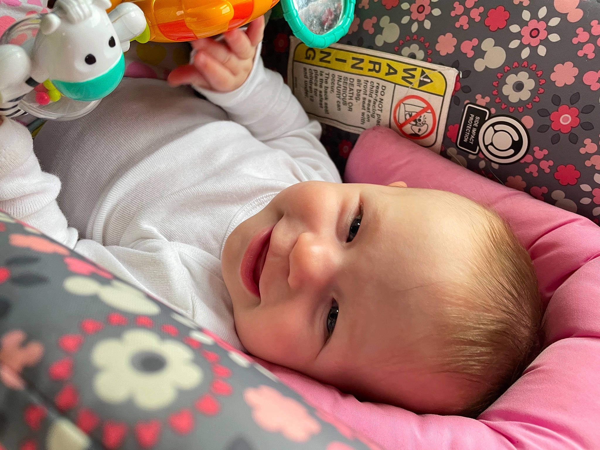 Payton joined the competition — help win amazing prizes! baby, baby_playing_with_toys, baby_products, bed, bedding, cheek, child, comfort, facial_expression, fun, happy, joy, linens, organ, person, product, room, skin, smile, textile