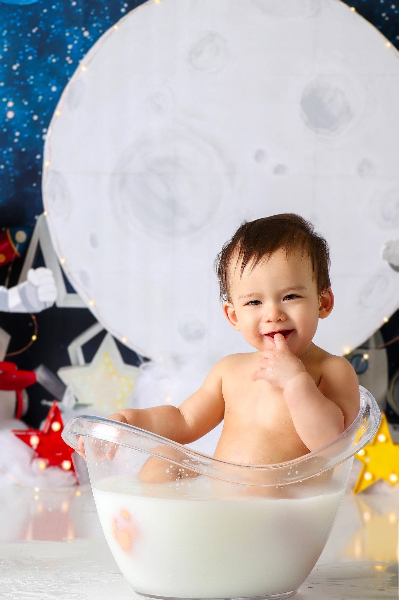 Julian is registered to the contest to win money with this photo: art, baby, baby_bathing, bathing, cheek, chest, child, circle, dishware, drinkware, event, fun, happy, joy, person, serveware, sitting, skin, smile, tableware