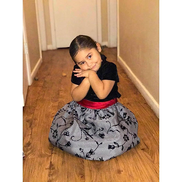 Irie is registered to the contest to win money with this photo: child, flooring, furniture, girl, joy, pattern, person, product, sitting, toddler