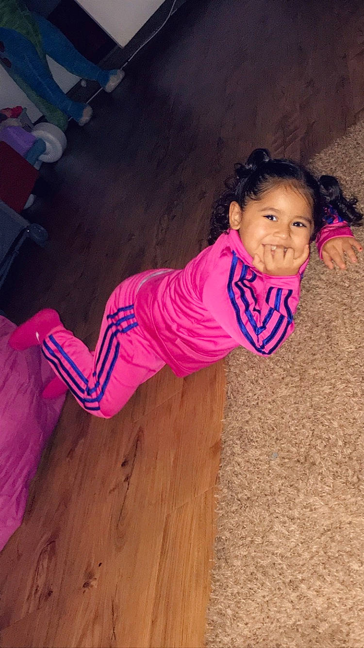 Irie is registered to the contest to win money with this photo: child, cool, day, floor, flooring, fun, girl, happiness, human, human_body, joy, leg, person, pink, product, purple, sitting, skin, smile, standing