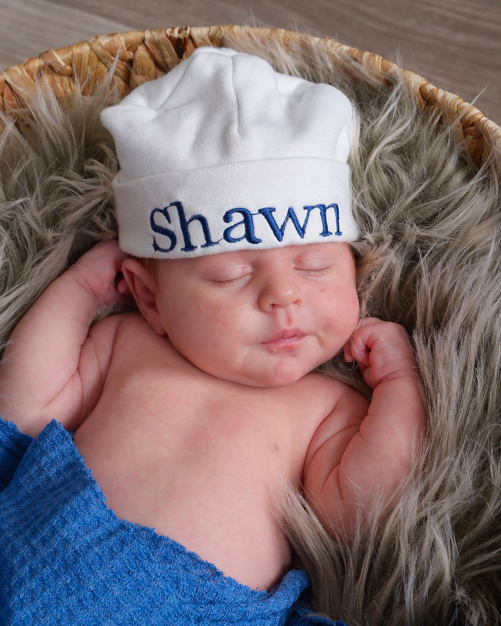 Shawn is registered to the contest to win money with this photo: abdomen, baby, baby_sleeping, baby_toddler_clothing, blond, blue, cap, chest, eye, eyelash, finger, gesture, glasses, hair_accessory, happy, headband, headpiece, headwear, nail, neck