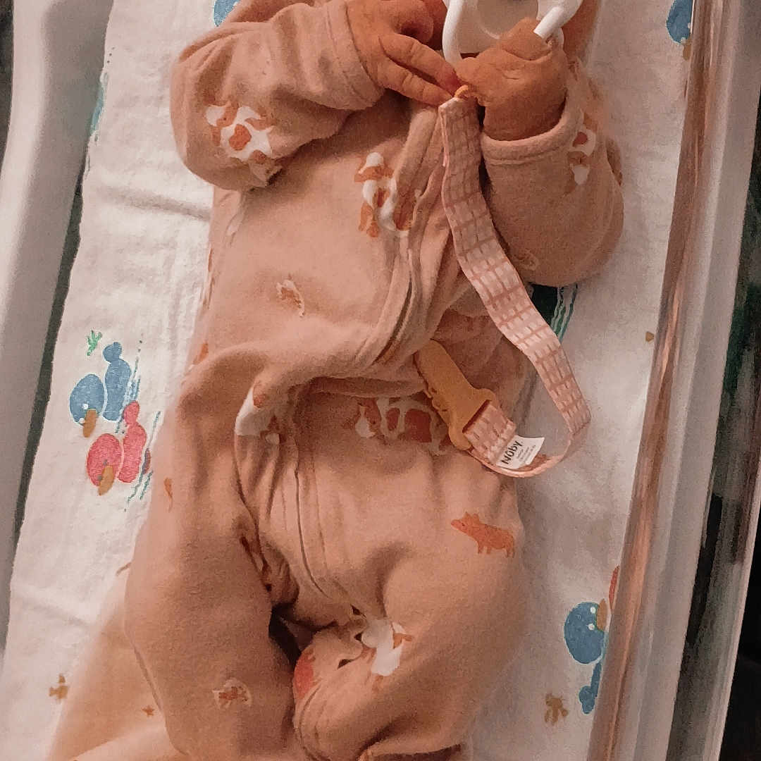 Octavia joined the competition — help win amazing prizes! animal_print, baby, bassinet, blanket, child, cozy, cute, hospital, indoors, infant, newborn, nursery, onesie, pacifier, peaceful, pink_clothing, resting, sleeping, small_hands, soft_lighting