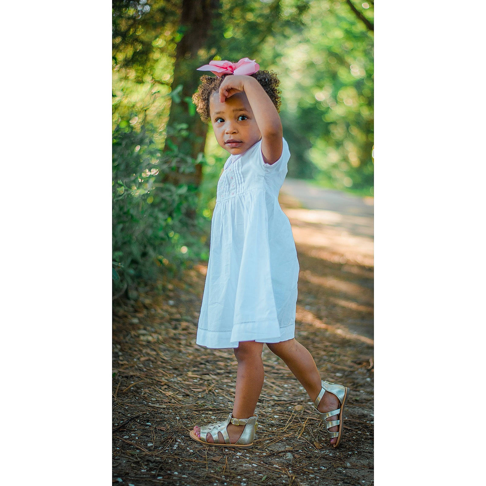 Melania is registered to the contest to win money with this photo: baby_toddler_clothing, child_model, day_dress, dress, embellishment, hair_accessory, headband, headpiece, headwear, lavender, one_piece_garment, pattern, people_in_nature, person, portrait_photography, sandal, spring, toddler