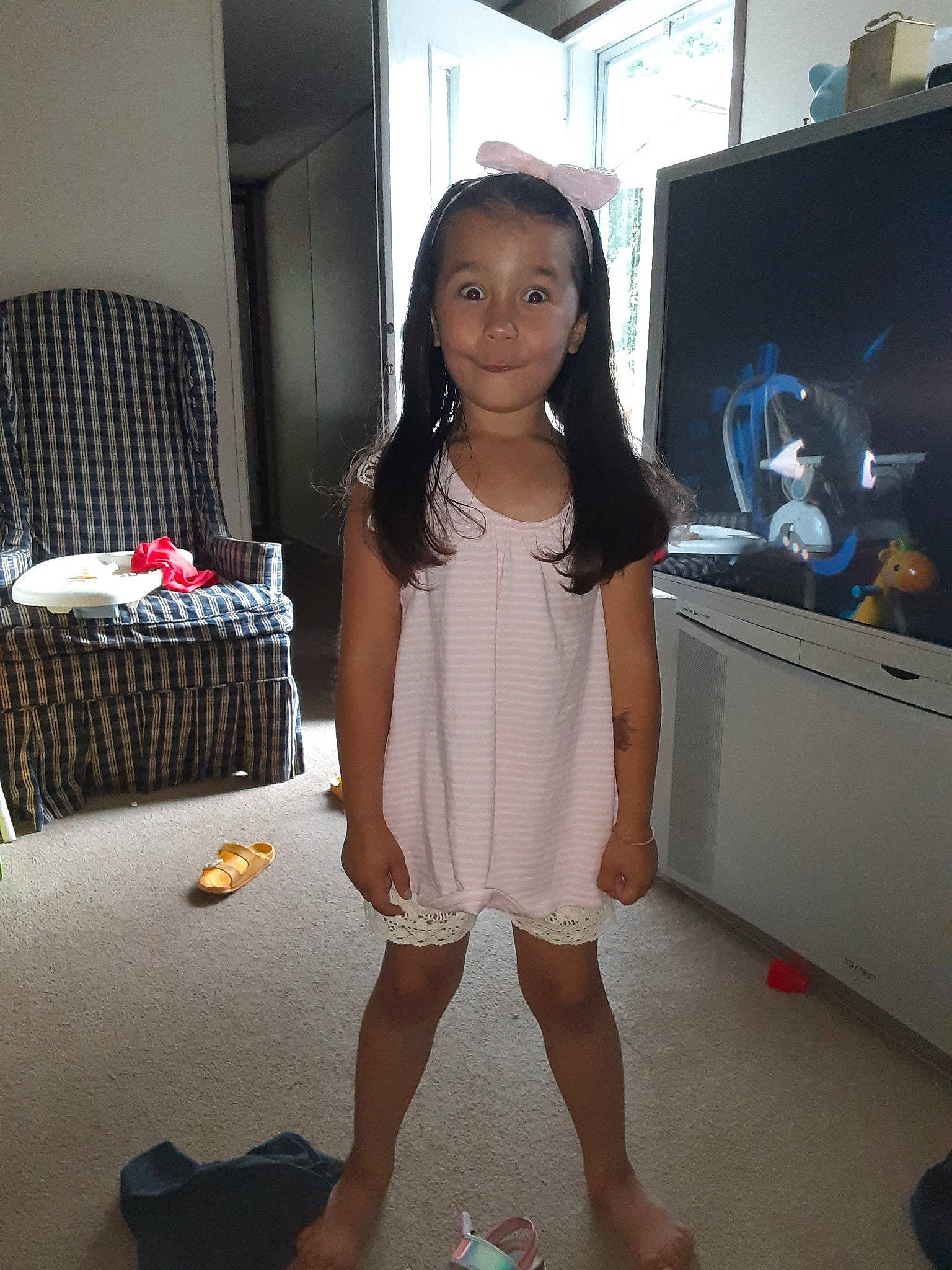 Raigan joined the competition — help win amazing prizes! black_hair, child, joy, leg, person, room, shoe, shoulder, skin, smile, snapshot, t_shirt, thigh, toddler, vacation, white