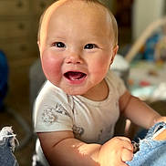 Wyatt joined the competition — help win amazing prizes! baby, child, smiling, happy, face, arm, denim, clothing, indoor, person, infant, cute, cheeks, eyes, hand, grip, casual, blush, young, portrait