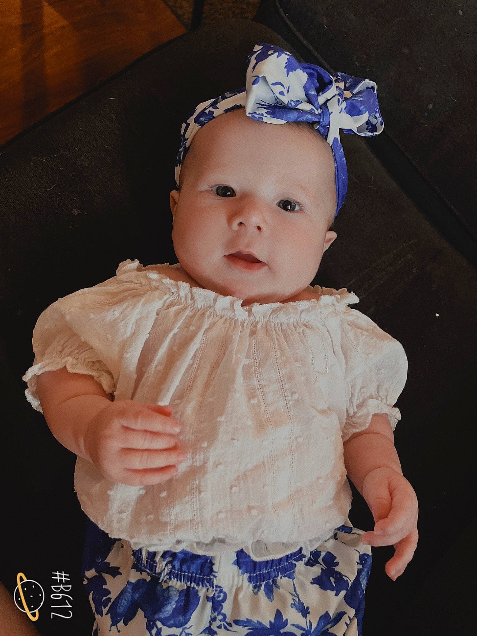 Emelia is registered to the contest to win money with this photo: baby, baby_toddler_clothing, blue, cheek, chin, costume_hat, day_dress, embellishment, eye, eyebrow, flash_photography, happy, headband, headgear, headpiece, iris, person, pink, ruffle, sleeve