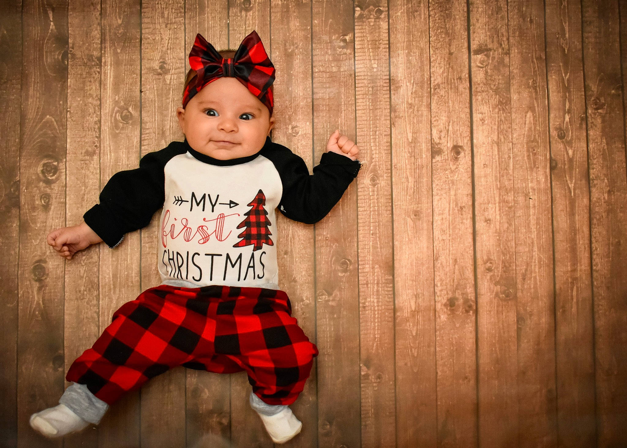 Jersey is registered to the contest to win money with this photo: baby, baby_toddler_clothing, costume, costume_accessory, costume_hat, crown, hair_accessory, headgear, headpiece, headwear, joy, party_supply, pattern, person, plaid, plank, sleeve, sock, tartan, toddler