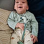 Ayden a rejoint le concours — aidez-le/la à gagner de superbes lots ! apparel, baby, child, clothing, comfort, couch, cute, fabric, happy, home, indoor, infant, pacifier, person, pillow, playful, relaxation, sitting, smiling, toddler