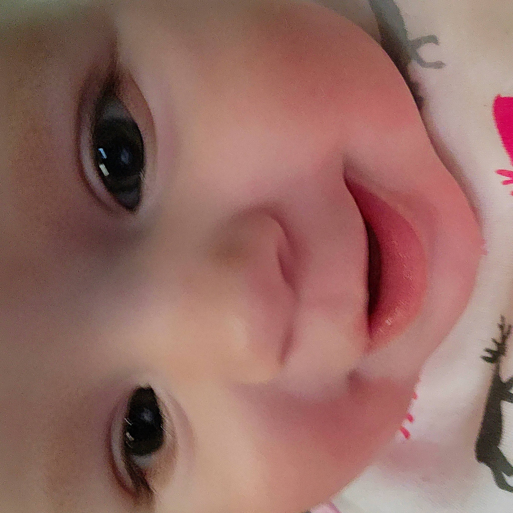 Stormi is registered to the contest to win money with this photo: cheek, chin, ear, eye, eyebrow, eyelash, facial_expression, forehead, head, human_body, iris, jaw, lip, mouth, neck, no_expression, nose, person, photograph, product