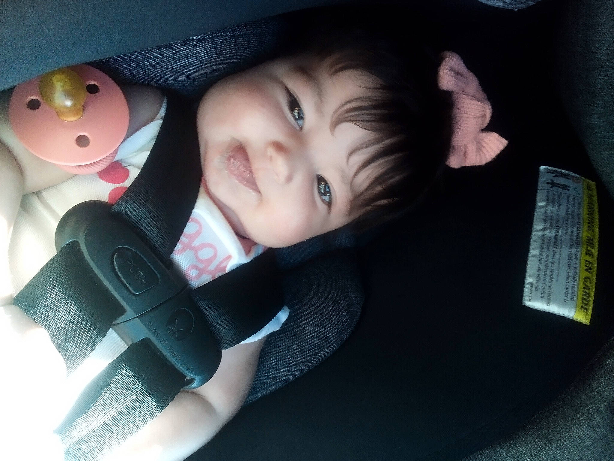 Alice joined the competition — help win amazing prizes! baby, baby_toddler_clothing, black_hair, car_seat, cheek, comfort, doll, eyebrow, eyelash, finger, flash_photography, gesture, iris, lip, nose, person, skin, sleeve, smile, toddler