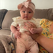 Avalynn is registered to the contest to win money with this photo: architecture, baby, bodypart, building, clothing, couch, cushion, face, finger, furniture, hand, hat, head, homedecor, indoors, livingroom, person, photography, portrait, room