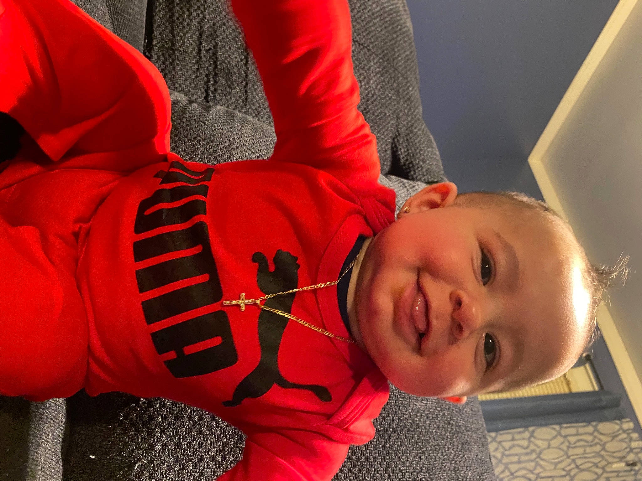 Jerry joined the competition — help win amazing prizes! baby_toddler_clothing, carmine, child, comfort, elbow, flooring, fun, happy, human_leg, joy, leisure, lip, mouth, nose, orange, person, plant, sitting, sleeve, smile