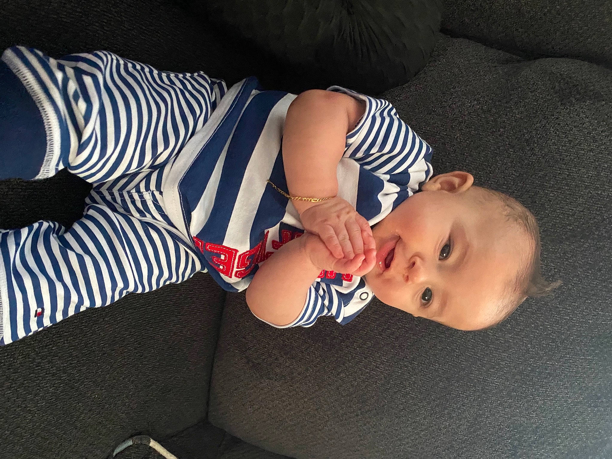 Jerry joined the competition — help win amazing prizes! baby, baby_toddler_clothing, child, comfort, elbow, electric_blue, finger, flag_of_the_united_states, human_body, human_leg, knee, pattern, person, sitting, sleeve, textile, thigh, toddler, wrist