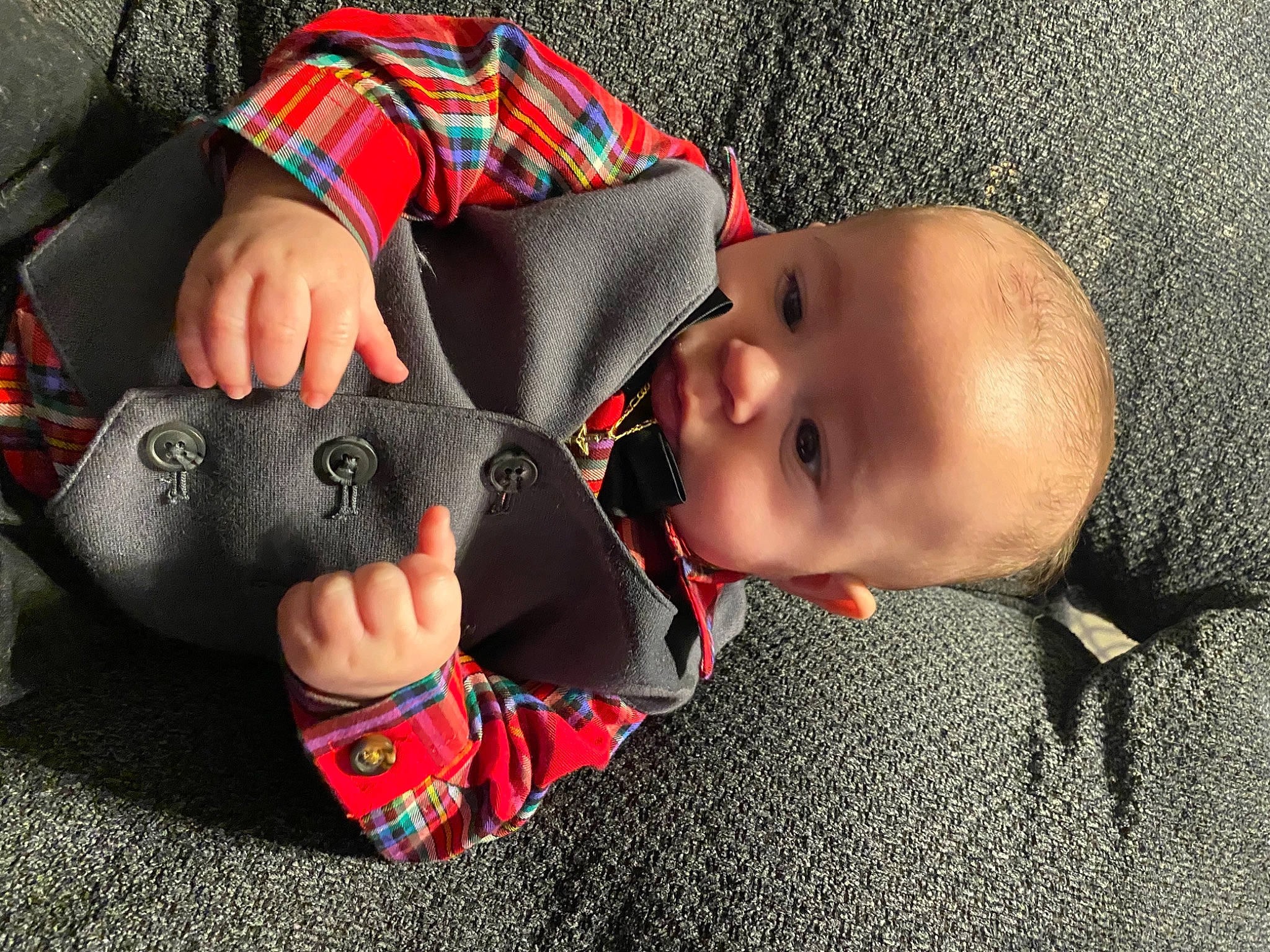 Xavier joined the competition — help win amazing prizes! baby, baby_products, baby_toddler_clothing, bag, carmine, cheek, comfort, finger, gesture, hand, mouth, nail, nose, pattern, person, personal_protective_equipment, sitting, skin, sleeve, toddler