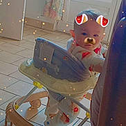 Keyden a rejoint le concours — aidez-le/la à gagner de superbes lots ! baby, baby_walker, child, clothing, curtains, dog_ears, dog_nose, door, face_filter, floor, footwear, home, indoor, person, playing, sparkles, tiled_floor, toy, walker, young_child