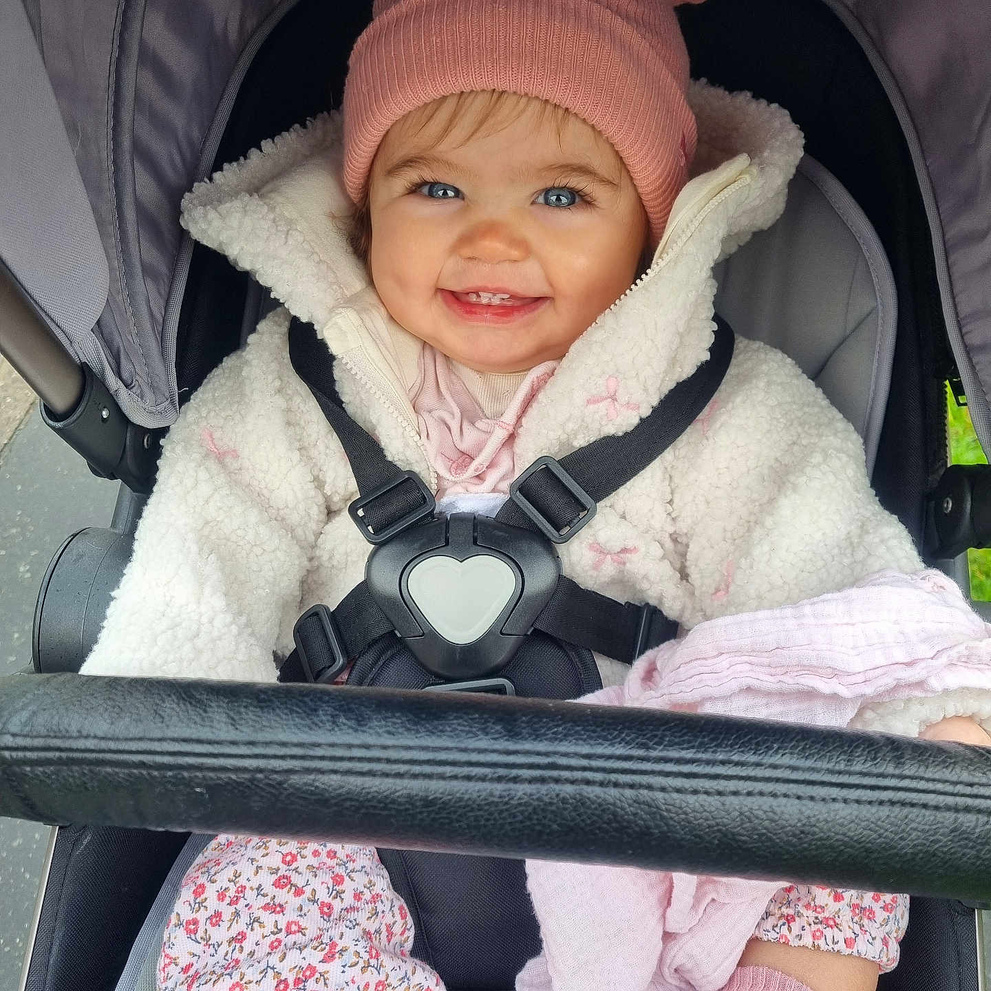 Ettie joined the competition — help win amazing prizes! baby, blanket, blue_eyes, child, clothing, coat, cute, happy, hat, infant, jacket, outdoor, person, pink, portrait, seatbelt, smiling, sock, stroller, warm_clothes