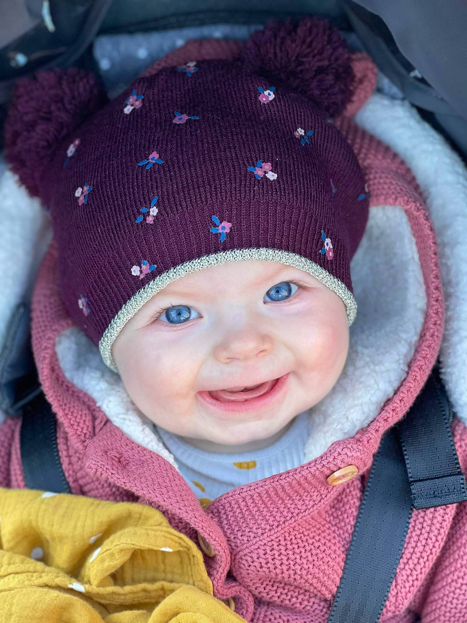 Elya a rejoint le concours — aidez-le/la à gagner de superbes lots ! baby, cap, cheek, eye, face, facial_expression, happy, head, headwear, human, joy, organ, outerwear, person, photograph, pink, product, purple, skin, smile