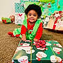 blackhair, child, christmas, face, female, festival, girl, hair, happy, head, openingpresent, person, photography, portrait, sitting, smile, toy
