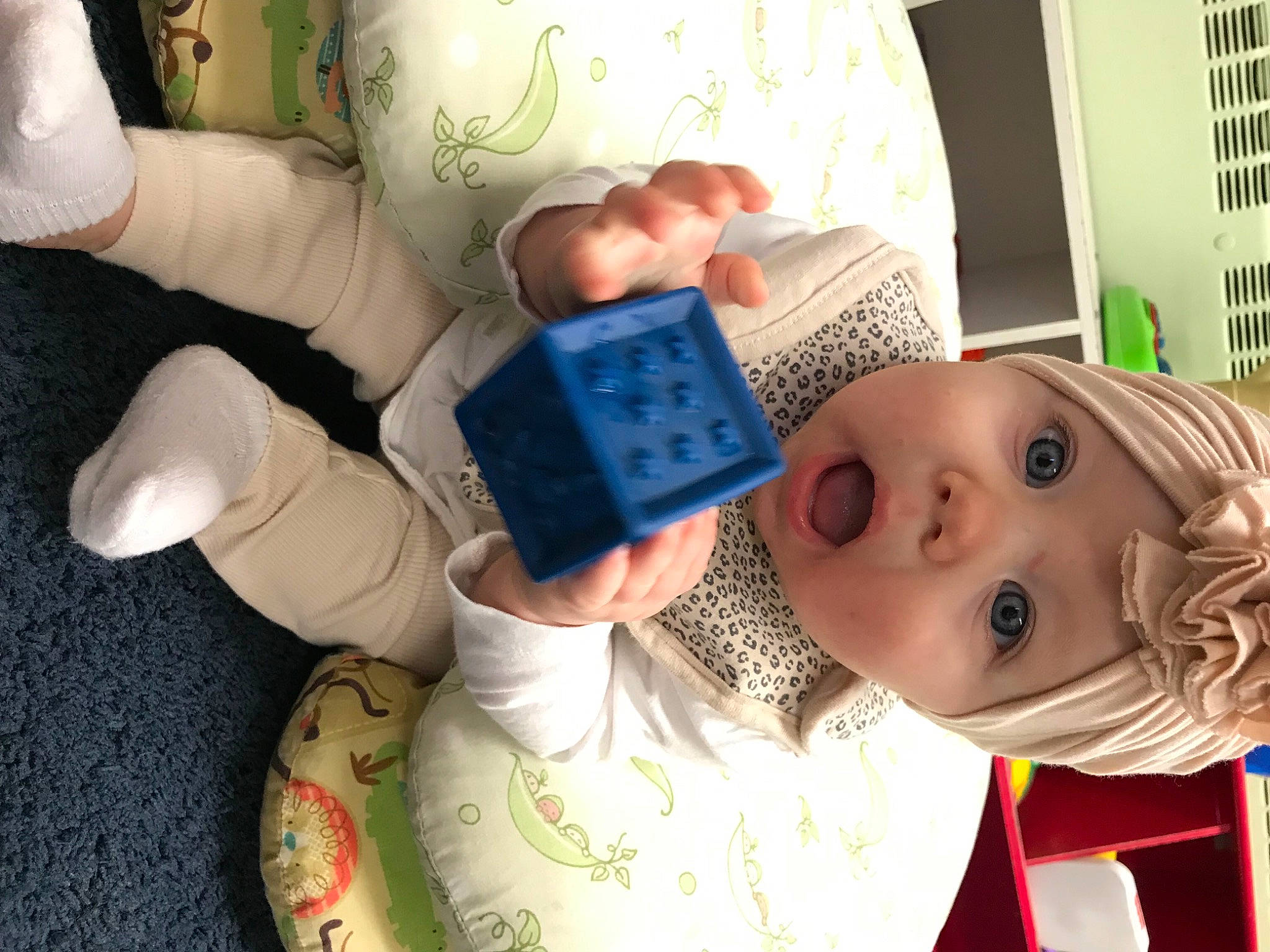 Kolbie joined the competition — help win amazing prizes! baby_toddler_clothing, child, communication_device, eyelash, finger, fun, gadget, happy, hat, headwear, illustration, nail, nose, person, play, portable_communications_device, room, sleeve, surprise, tablet_computer
