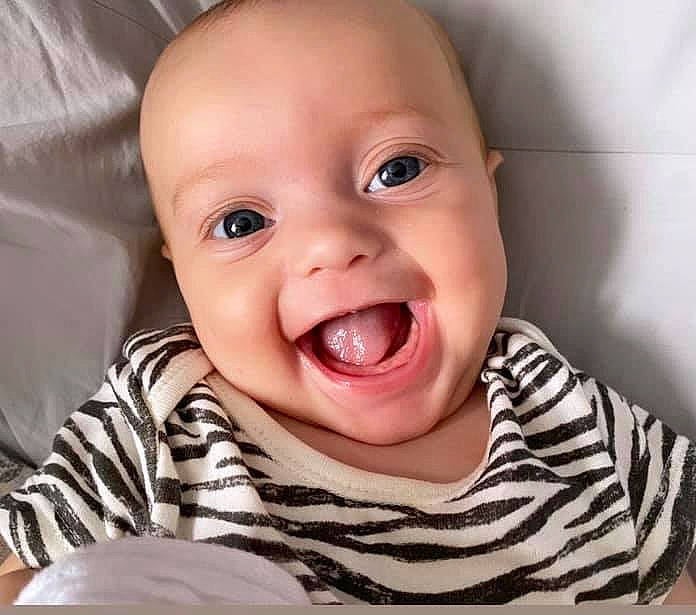Rosalie joined the competition — help win amazing prizes! baby, baby_laughing, baby_toddler_clothing, cheek, comfort, ear, eye, gesture, happy, iris, jaw, lip, mouth, nose, person, skin, sleeve, smile, toddler, tongue