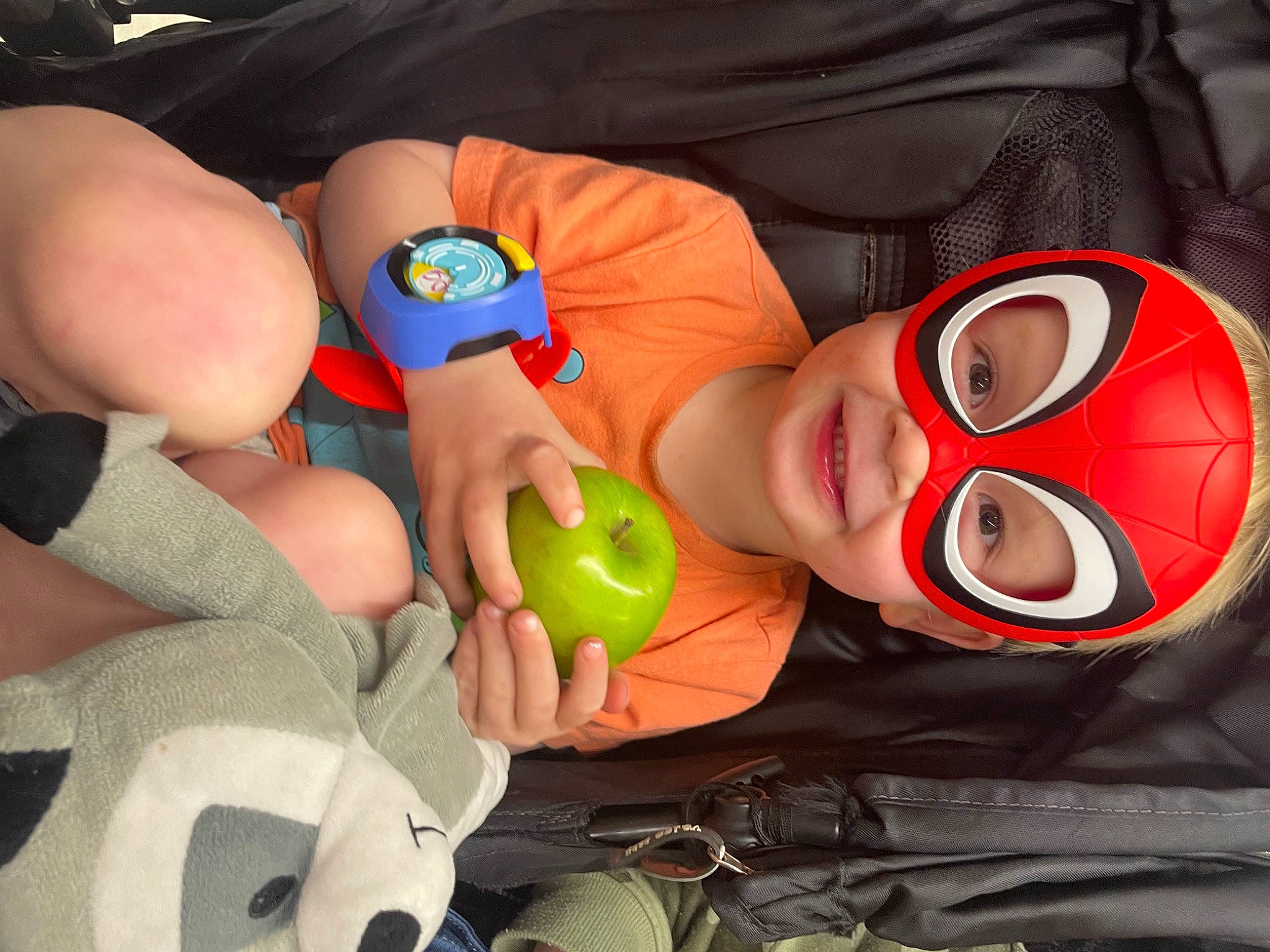 Archie is registered to the contest to win money with this photo: baby, baby_products, baby_toys, child, finger, foot, fun, happy, headwear, human_leg, mouth, nail, nose, orange, person, personal_protective_equipment, snapshot, stuffed_toy, thumb, toddler