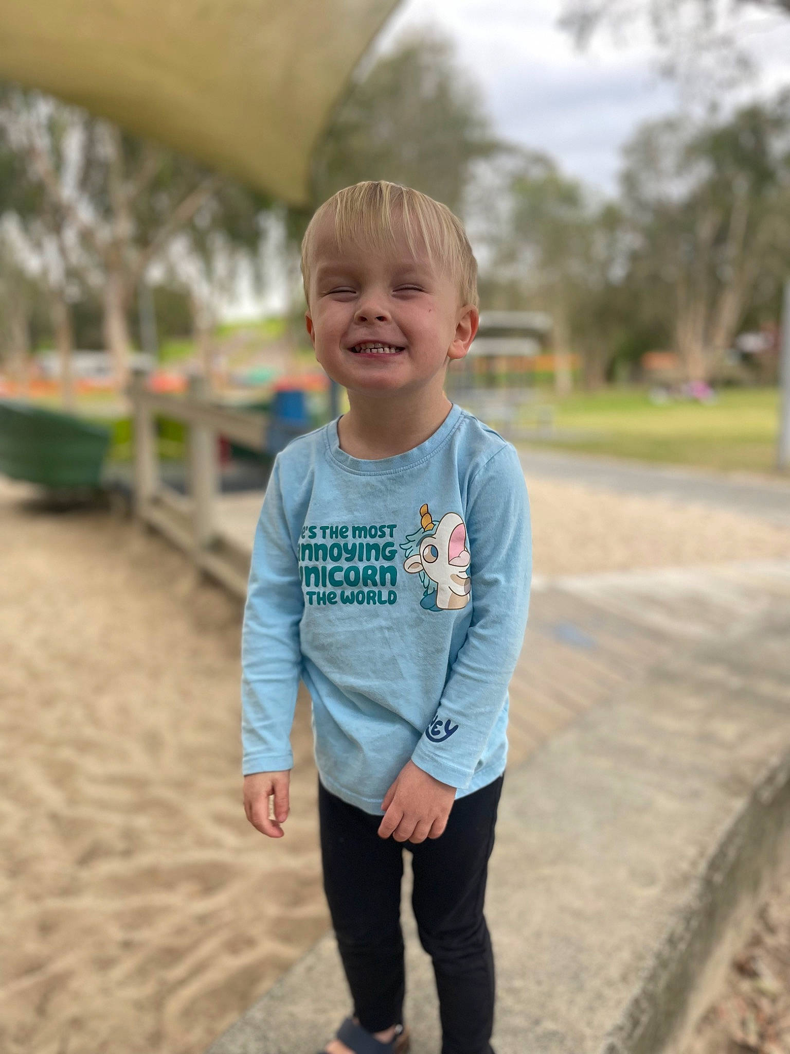 Archie joined the competition — help win amazing prizes! child, denim, electric_blue, fun, grass, happy, joy, leisure, person, plant, play, portrait_photography, public_space, recreation, sitting, skin, sleeve, smile, t_shirt, toddler