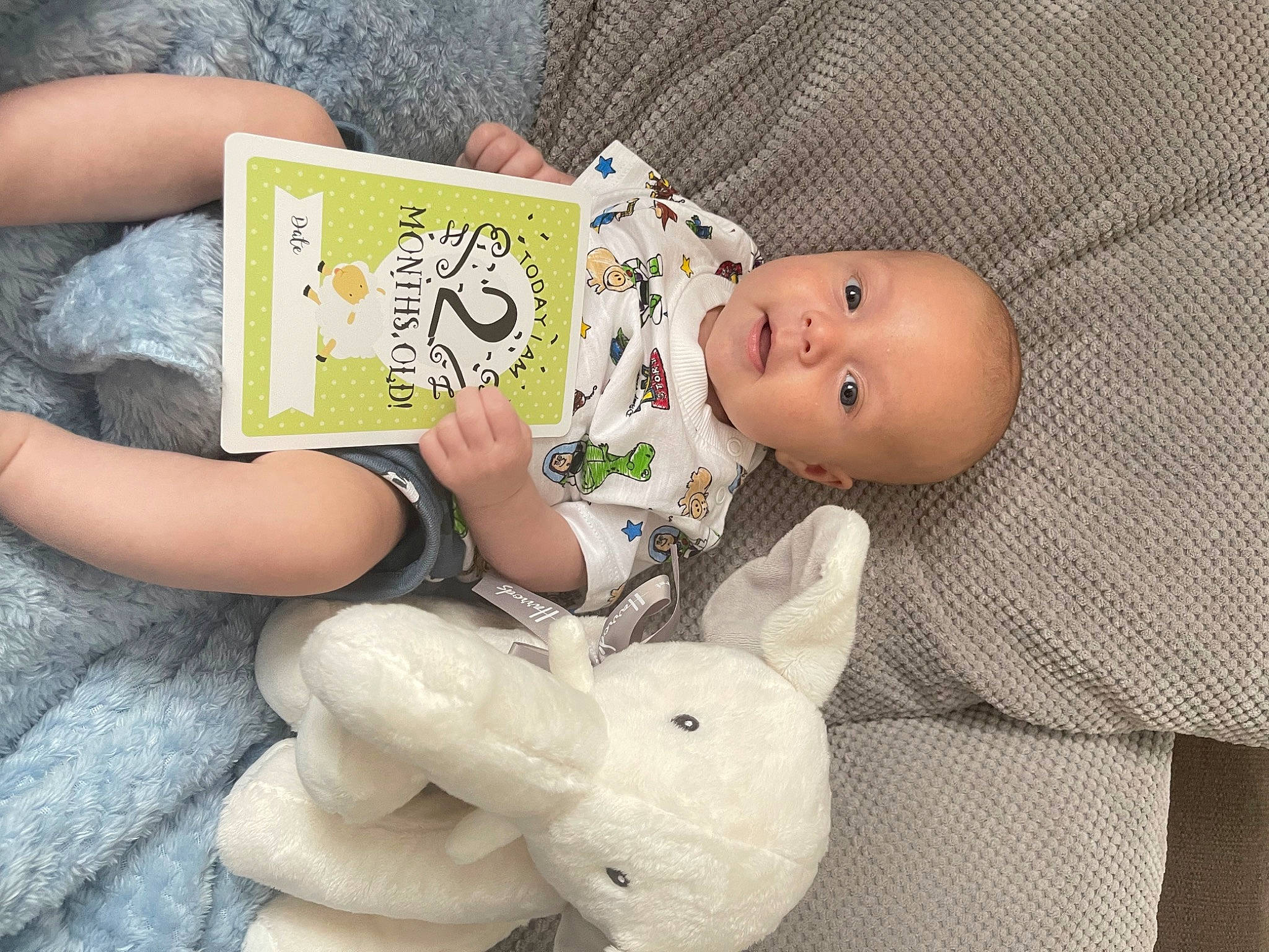 Hunter joined the competition — help win amazing prizes! baby, baby_products, baby_toddler_clothing, baby_toys, book, cheek, child, doll, finger, foot, gesture, nail, person, room, skin, stuffed_toy, thigh, thumb, toddler, toy