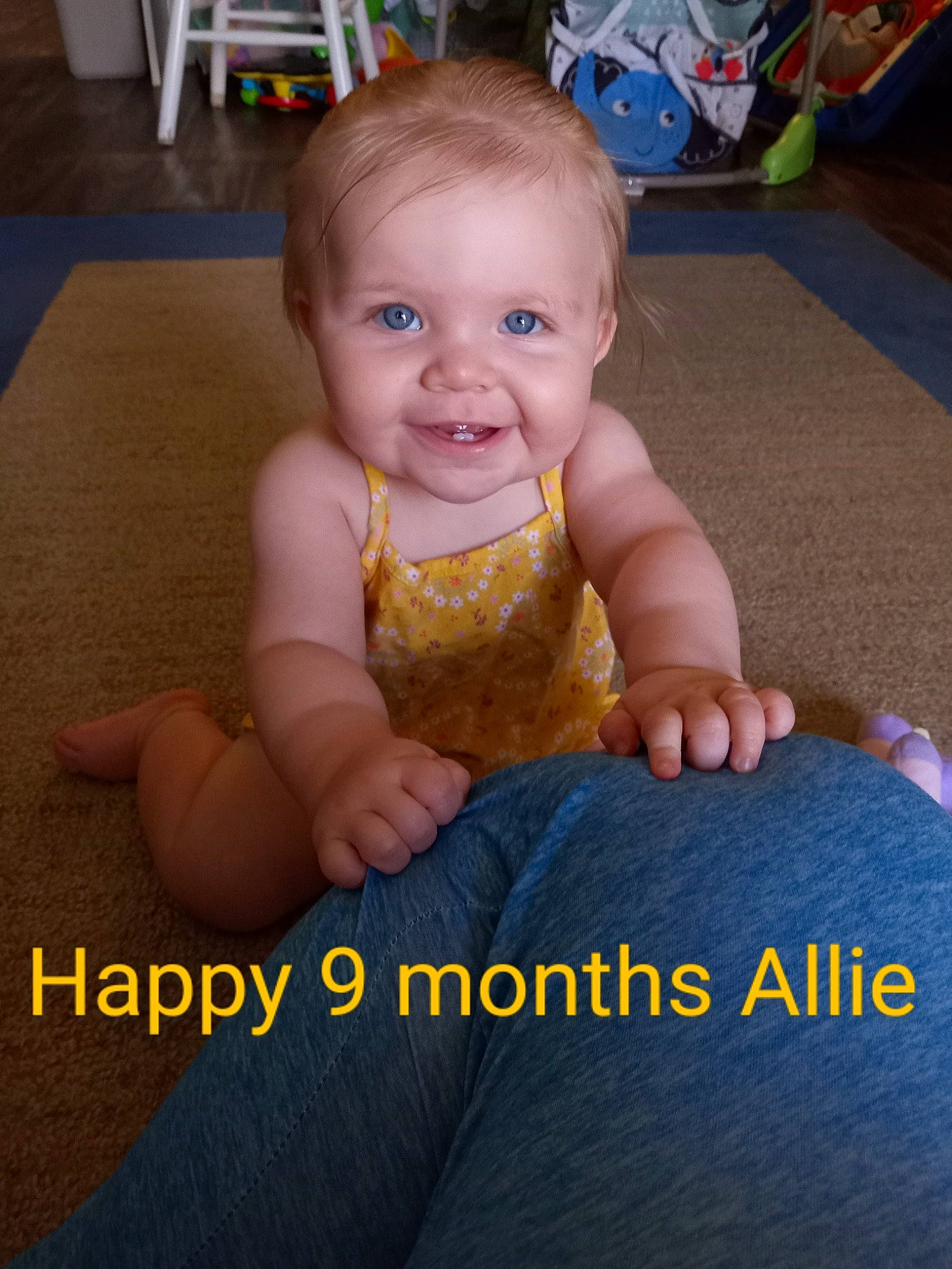 Allie joined the competition — help win amazing prizes! baby, baby_toddler_clothing, cheek, eye, facial_expression, finger, gesture, hand, happy, head, iris, joy, mouth, nose, person, product, skin, sleeve, smile, textile
