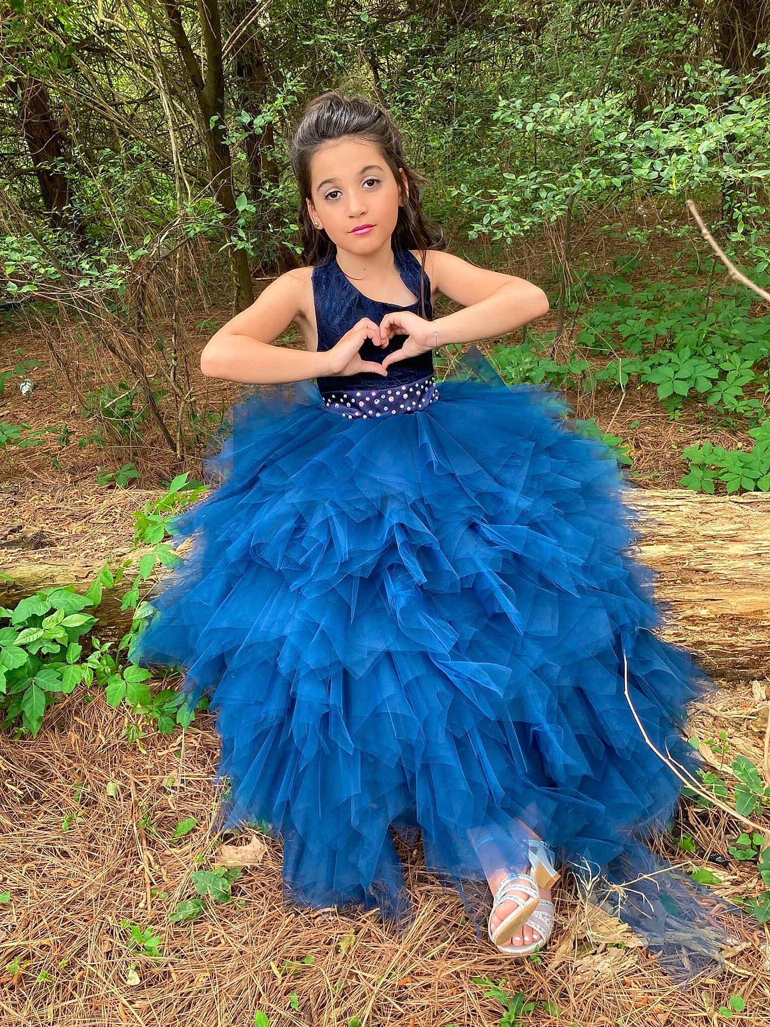 Jasmine joined the competition — help win amazing prizes! beauty, bridal_party_dress, day_dress, electric_blue, event, eye, face, forest, formal_wear, gown, grass, hair, happy, one_piece_garment, people_in_nature, person, plant, strapless_dress, tree, trunk