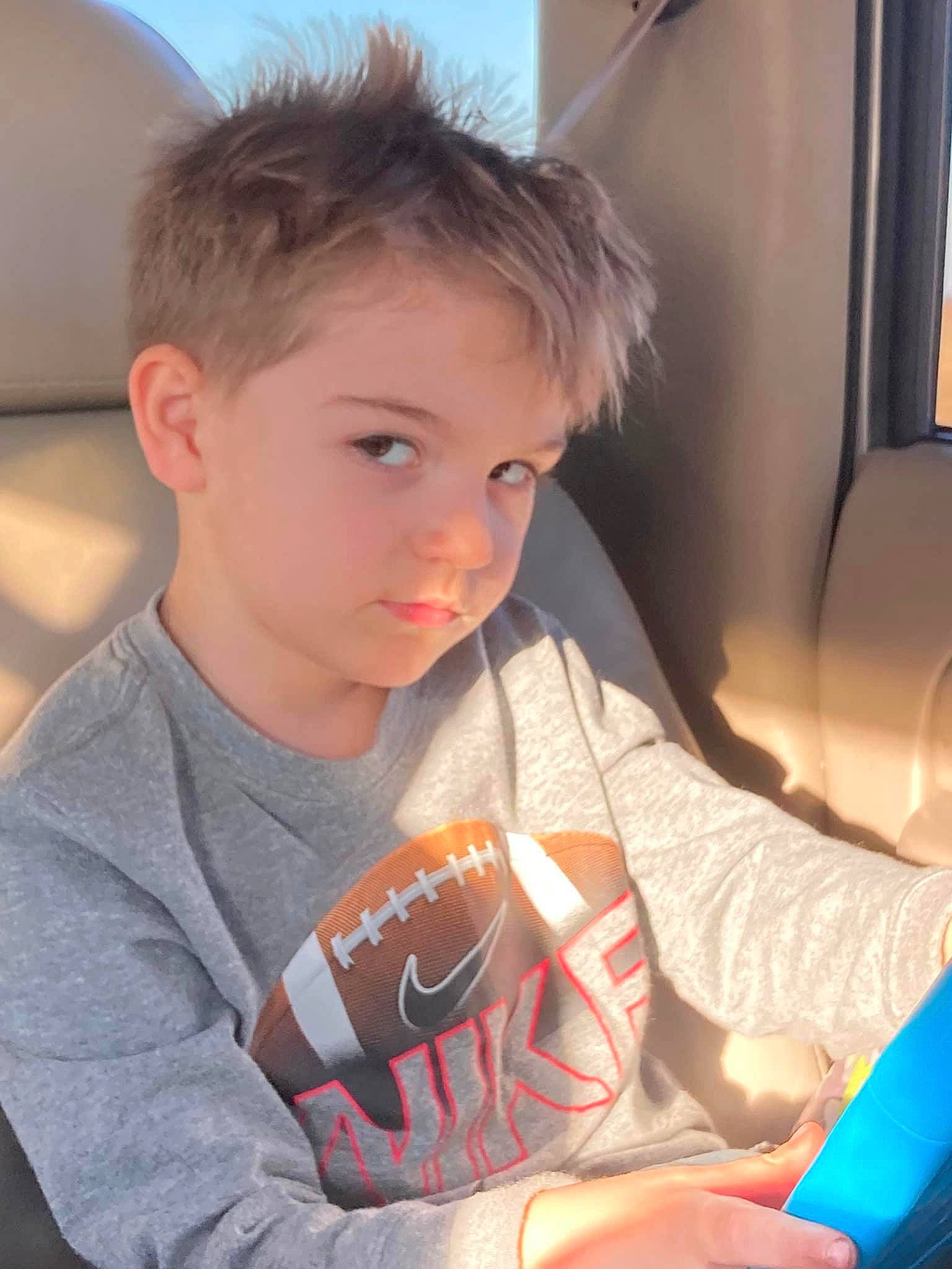 Hunter joined the competition — help win amazing prizes! arm, auto_part, automotive_exterior, child, chin, face, family_car, finger, fun, hairstyle, hand, happy, human_body, lap, luxury_vehicle, person, sitting, t_shirt, toddler, vehicle_door