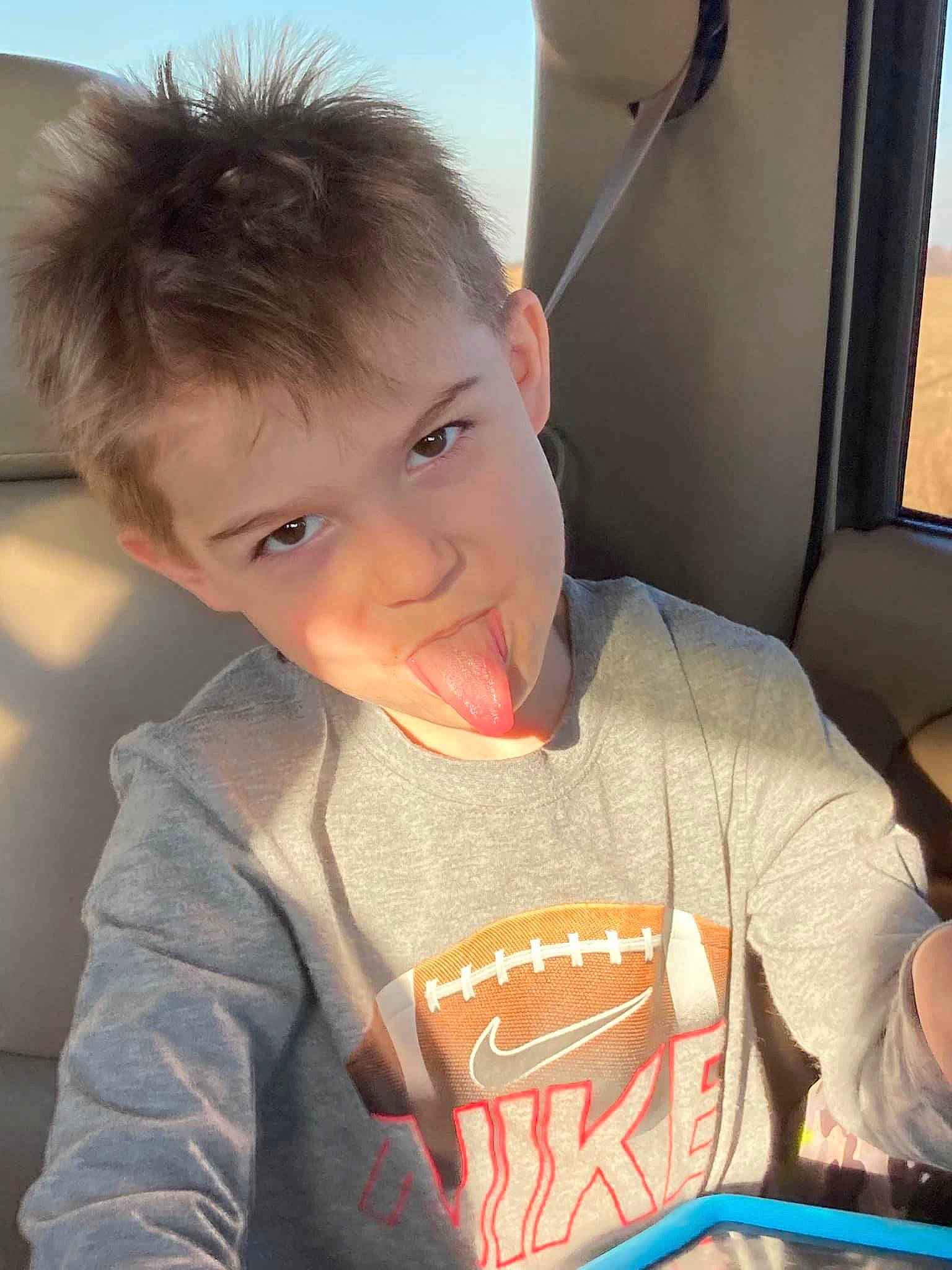 Hunter is registered to the contest to win money with this photo: arm, cheek, chin, ear, eyebrow, eyelash, forehead, gesture, hand, happy, jaw, lip, mammal, mouth, neck, nose, organ, person, skin, sleeve