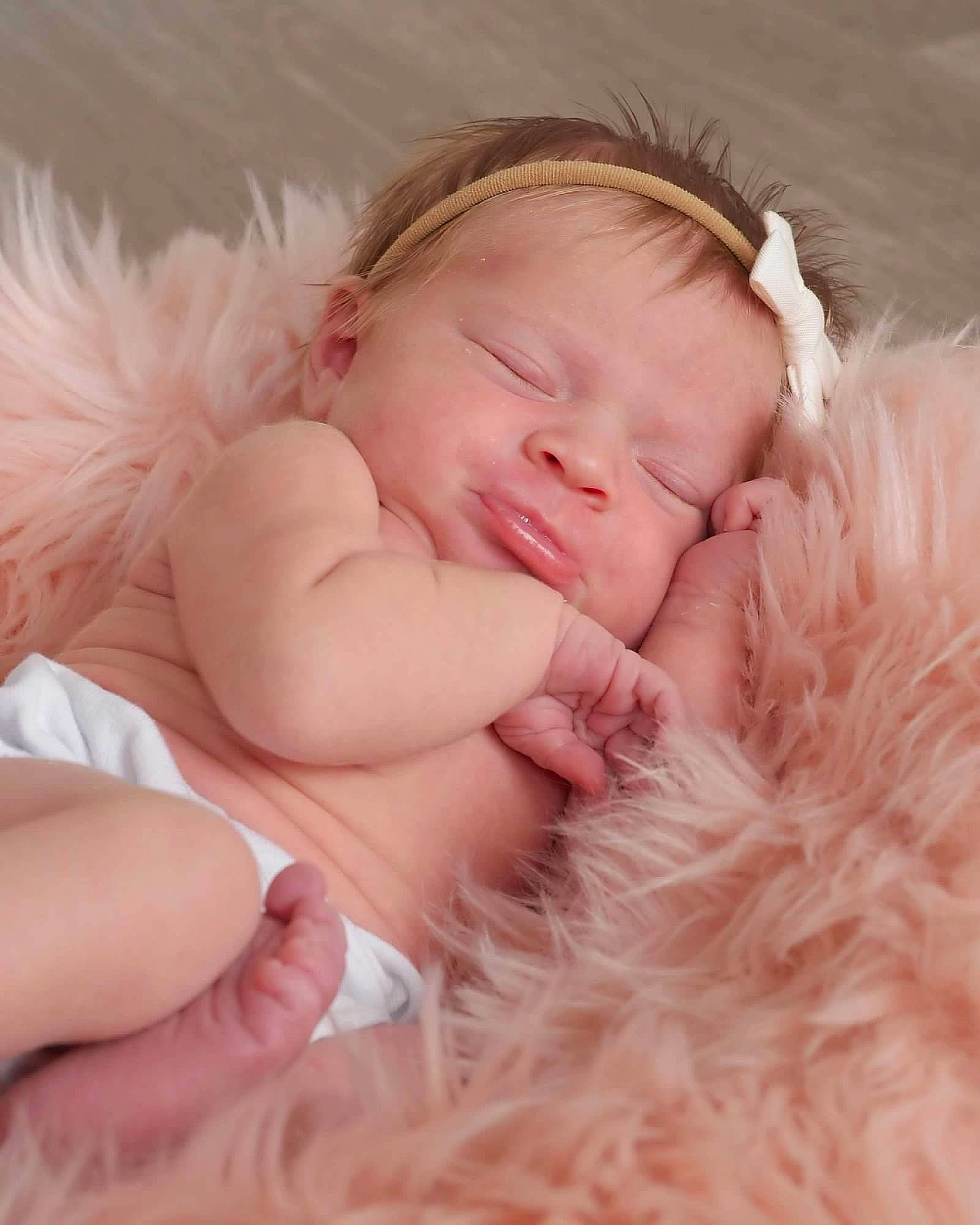 Emersyn is registered to the contest to win money with this photo: baby, baby_sleeping, bedtime, child, comfort, eyelash, face, finger, fur, gesture, grass, hand, happy, linens, mammal, nap, peach, person, pink, skin