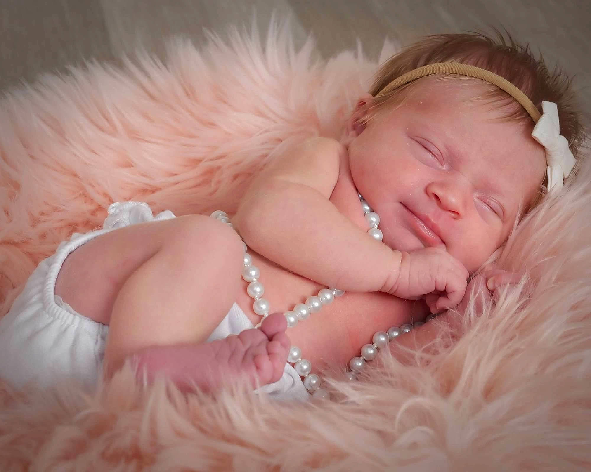 Emersyn joined the competition — help win amazing prizes! baby, baby_toddler_clothing, brown_hair, comfort, couch, ear, embellishment, fashion_accessory, flash_photography, fur, gesture, hair_accessory, happy, hat, headband, headpiece, iris, jewellery, person, pink