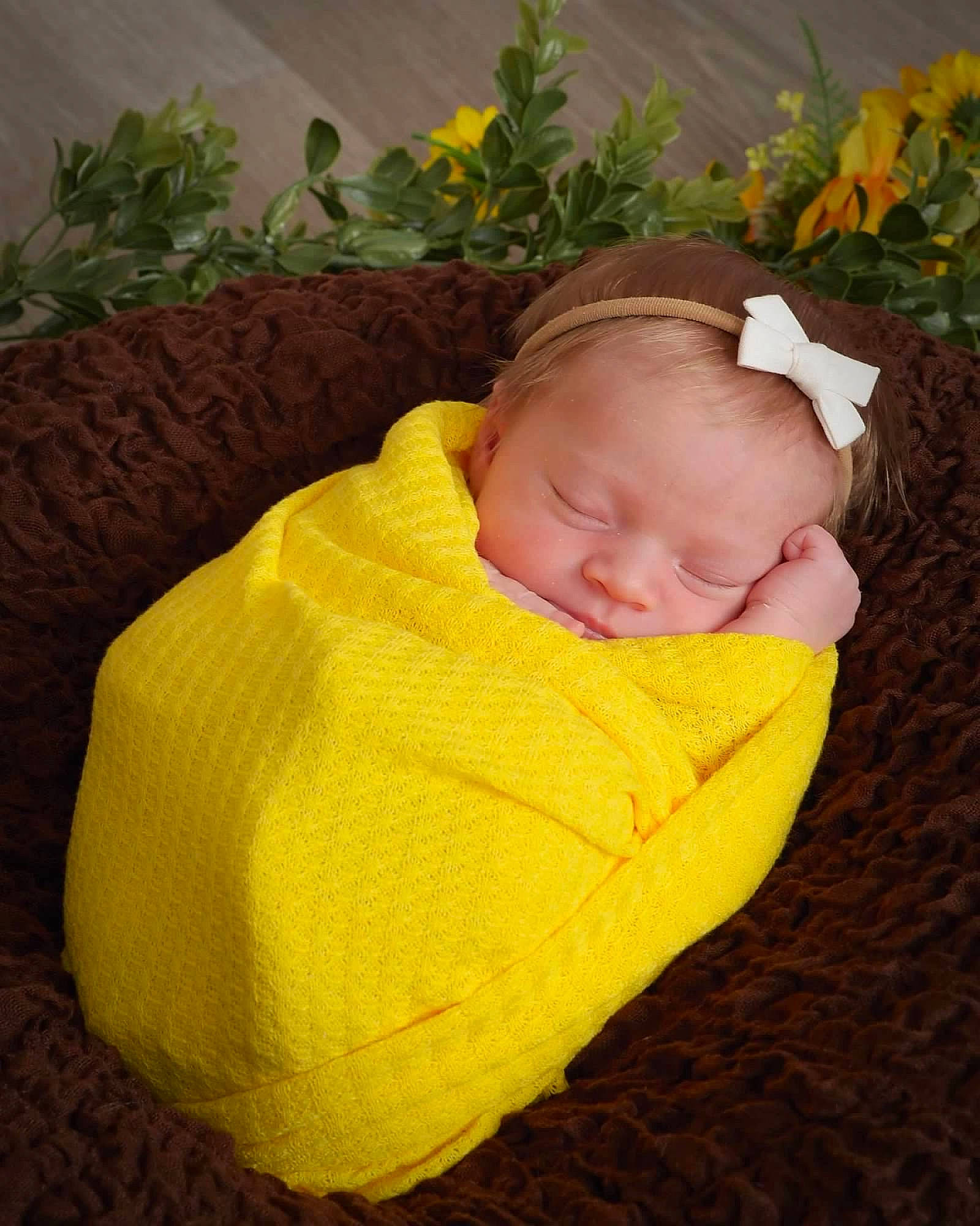 Emersyn joined the competition — help win amazing prizes! baby, baby_sleeping, baby_toddler_clothing, child, comfort, fashion_accessory, flooring, flower, grass, happy, linens, people_in_nature, person, plant, sitting, toddler, towel, tree, wood, wool