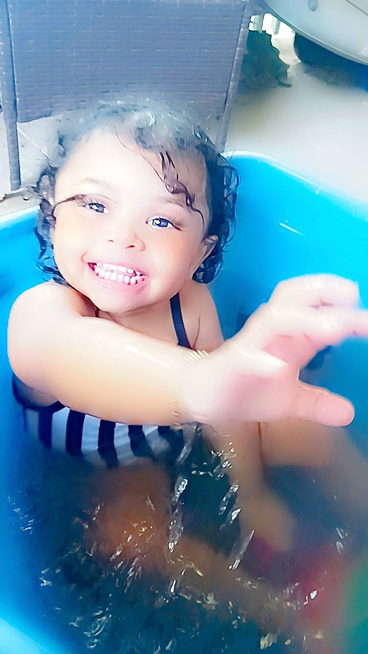 Aziza joined the competition — help win amazing prizes! azure, bathing, black_hair, chest, child, electric_blue, face, flash_photography, fun, happy, joy, leisure, nonbuilding_structure, person, play, plumbing, portrait_photography, recreation, smile, swimming_pool