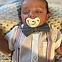 Jaxon is registered to the contest to win money with this photo: baby, sleeping, pacifier, bow_tie, suspenders, white_shirt, crocheted_blanket, infant, face, clothing, portrait, hands, peaceful, closeup, indoors, soft_light, cute, child, resting, newborn