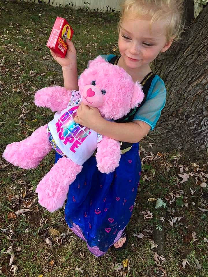 Alyssa is registered to the contest to win money with this photo: child, person, pink, play, smile, stuffed_toy, teddy_bear, toddler