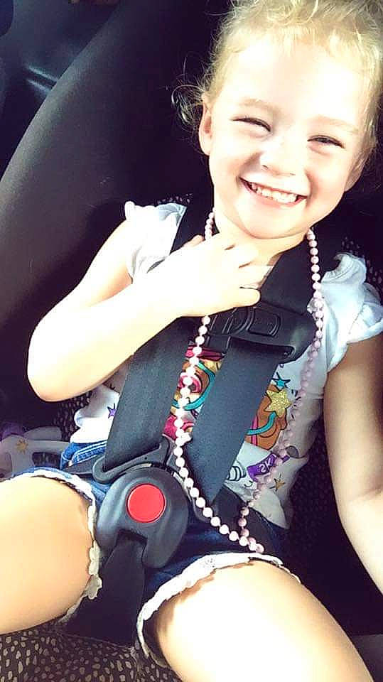 Alyssa is registered to the contest to win money with this photo: arm, auto_part, black_hair, child, cool, fashion_accessory, finger, fun, hand, happy, joy, leg, person, photography, smile, thigh, toddler