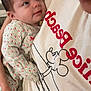 Emery joined the competition — help win amazing prizes! baby, child, closeup, clothing, comfort, cute, face, family, hand, holding, indoor, infant, love, mickey_mouse, onesie, pattern, person, portrait, skin, tshirt