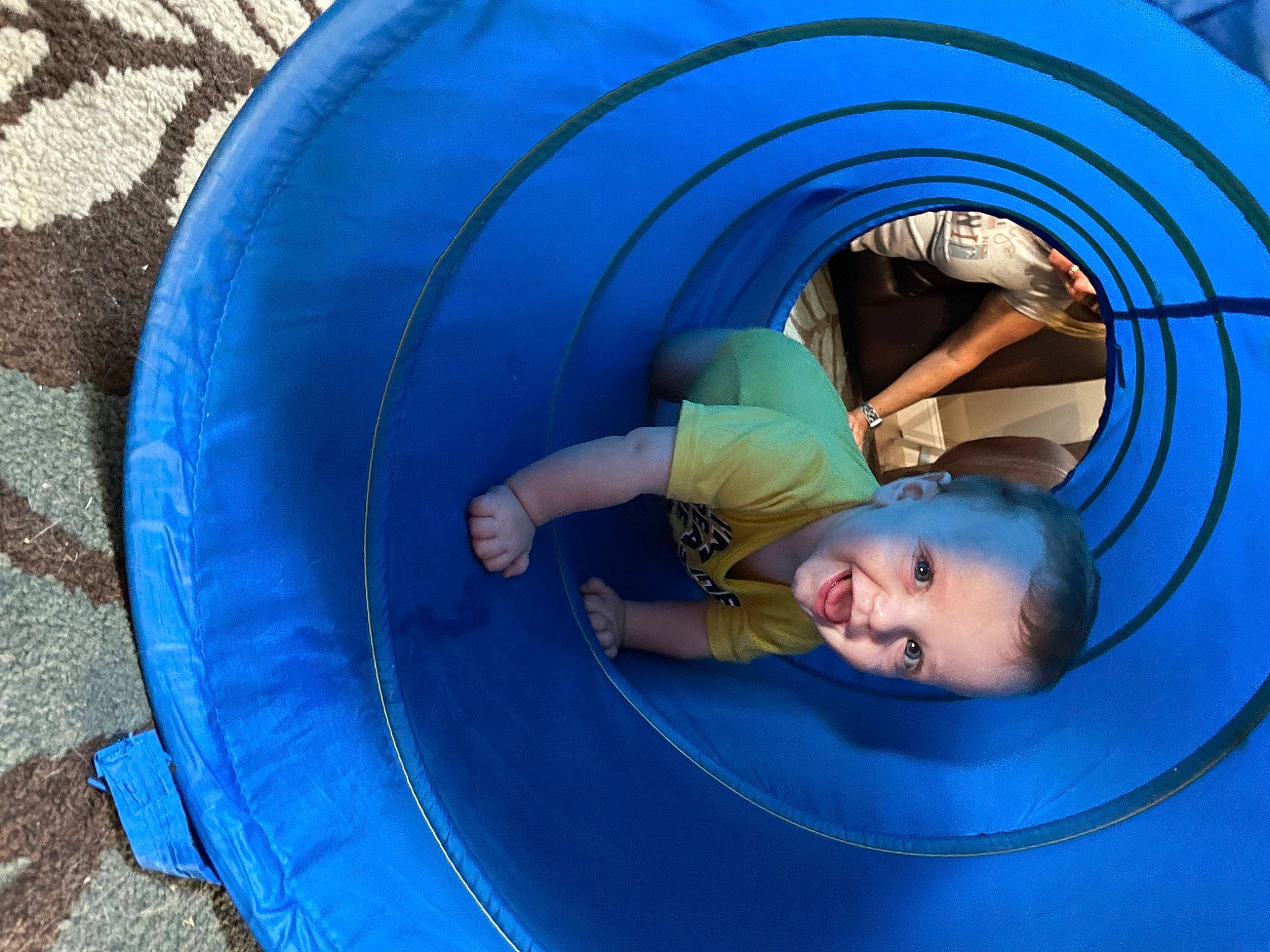Asher is registered to the contest to win money with this photo: aqua, baby, blue, child, circle, electric_blue, fun, games, inflatable, leisure, person, play, playground, recreation, symmetry, toddler